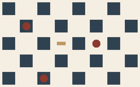 A repeating geometric pattern of ivory, rust and deep blue blocks